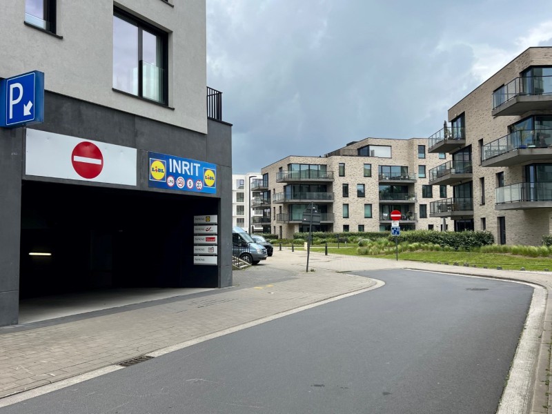 Parkeerplaats gelegen in residentie Tribeca  - agence rosseel