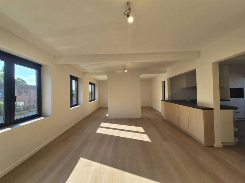 Ruim triplex appartement met polyvalente ruimte op toplocatie in het hart van Wetteren - Immo-Zone