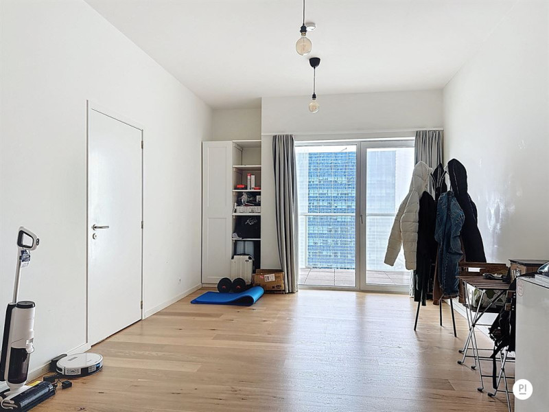 Licht en stijlvol appartement met terras & uitzicht 11de verdieping in een trendy toren in Antwerpen - PandInvest