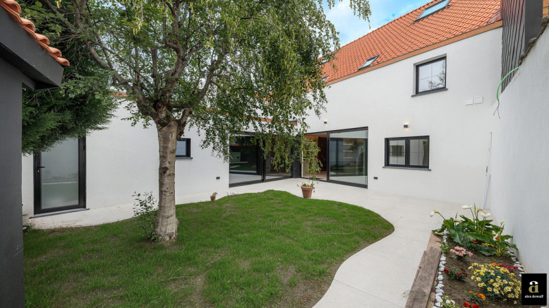 Brede stadswoning met garage en zonnige stadstuin te Heist   - Alex Dewulf
